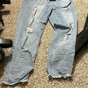 Iight washed distressed maternity jeans.